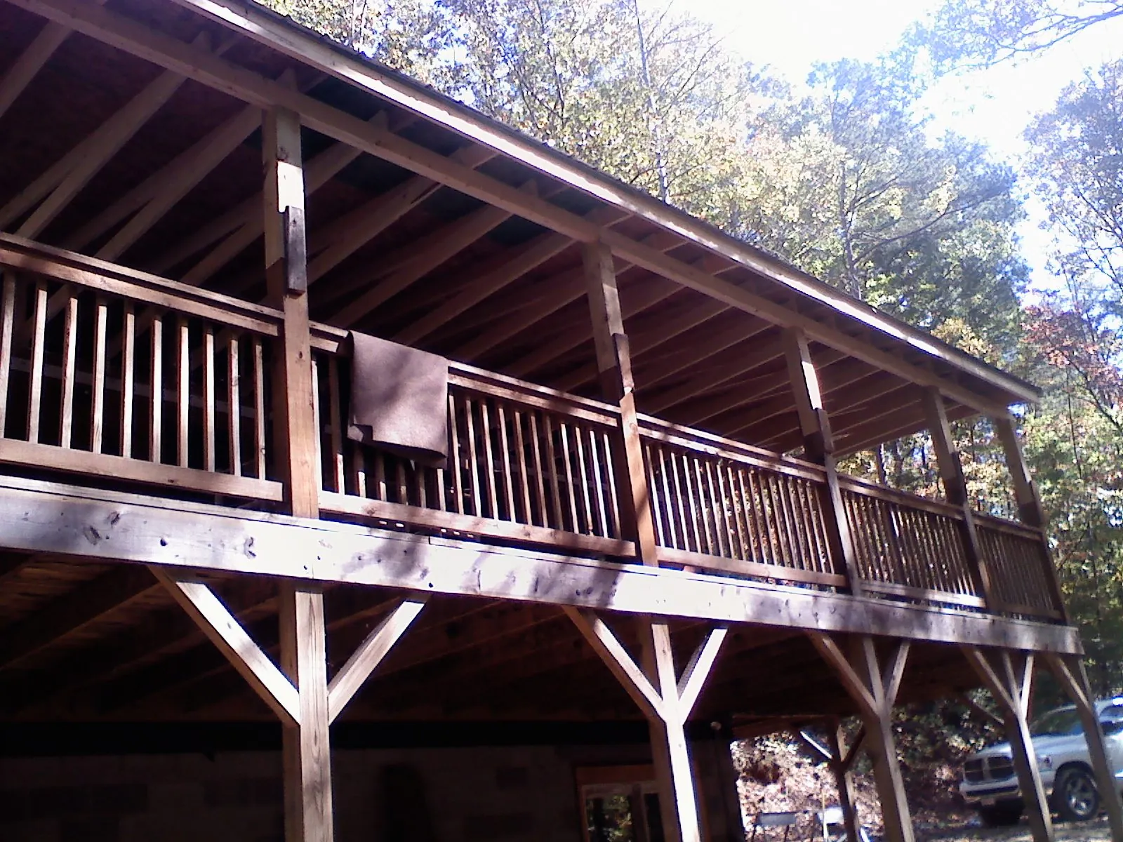 Timber framing under a new elevated porch and deck — Roof Leak Repair in Kentwood by Roofing Brothers